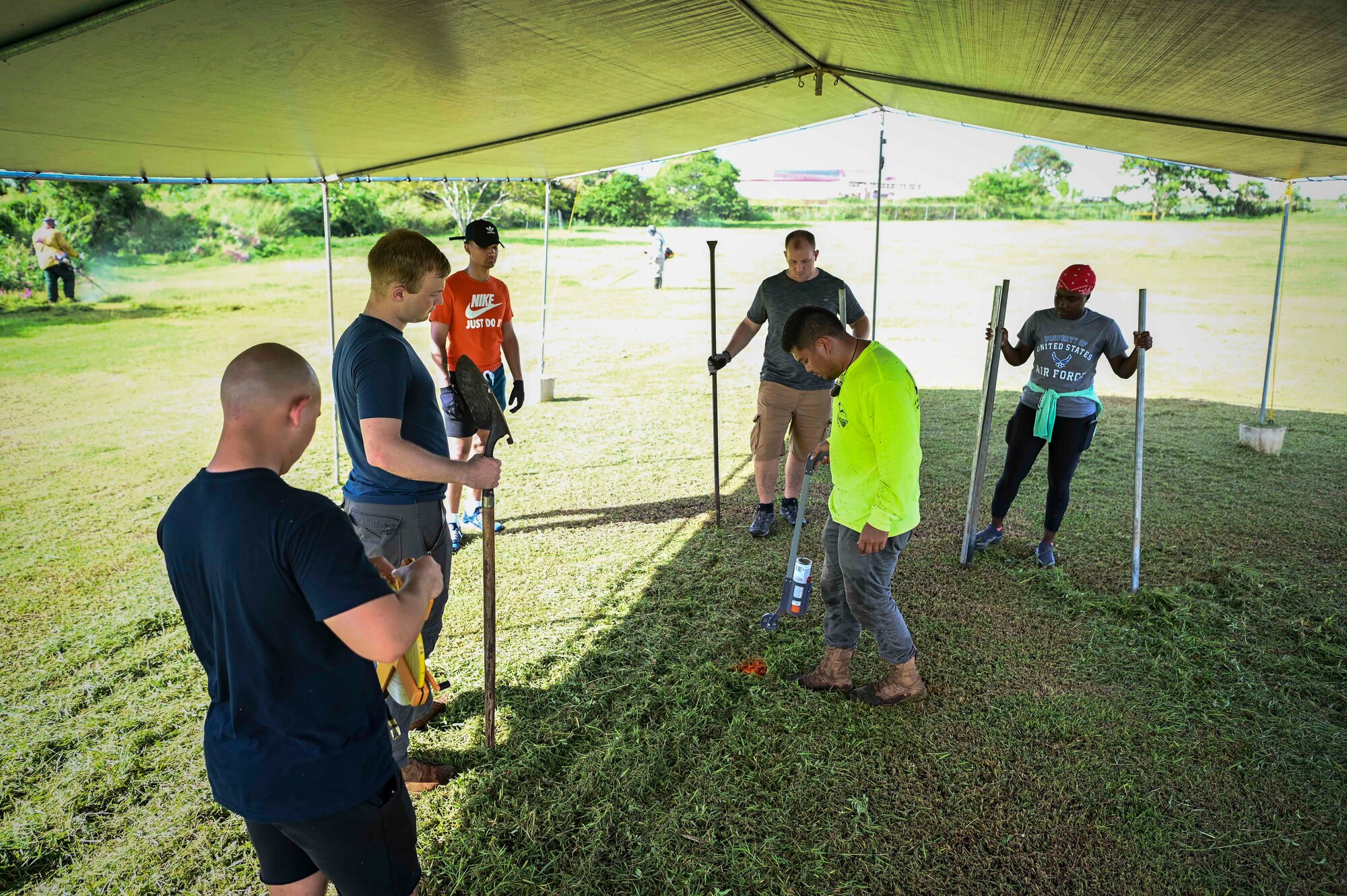 Airmen from the 36th Logistics Readiness Squadron and the 36th Maintenance Squadron, partners with the Guam Urban Community Forestry Program to help plant trees at P.C. Lujan Elementary School in support of Guam Arbor Day in Barrigada, Guam, Oct. 10, 2022.