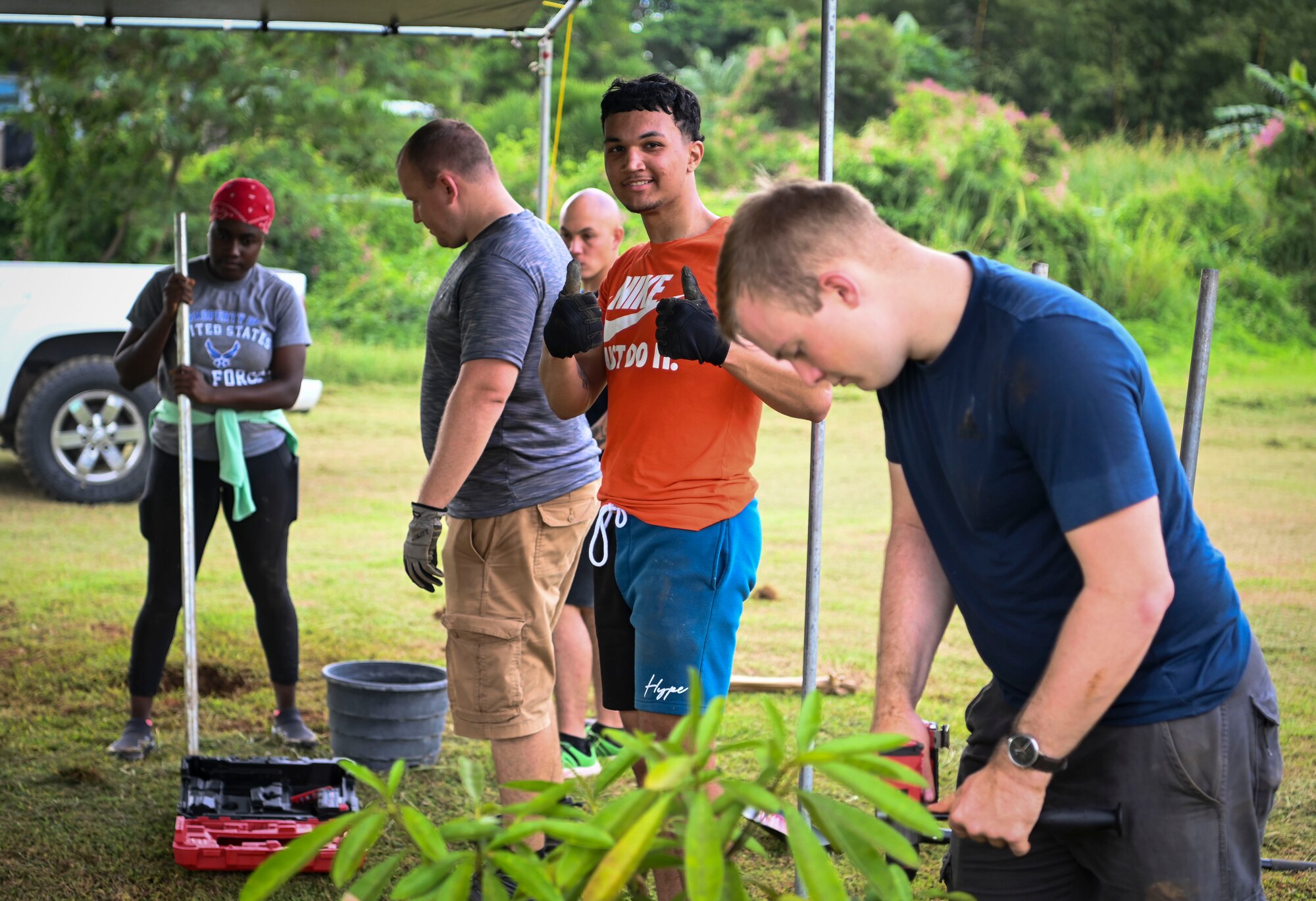 Airmen from the 36th Logistics Readiness Squadron and the 36th Maintenance Squadron, partners with the Guam Urban Community Forestry Program to help plant trees at P.C. Lujan Elementary School in support of Guam Arbor Day in Barrigada, Guam, Oct. 10, 2022.