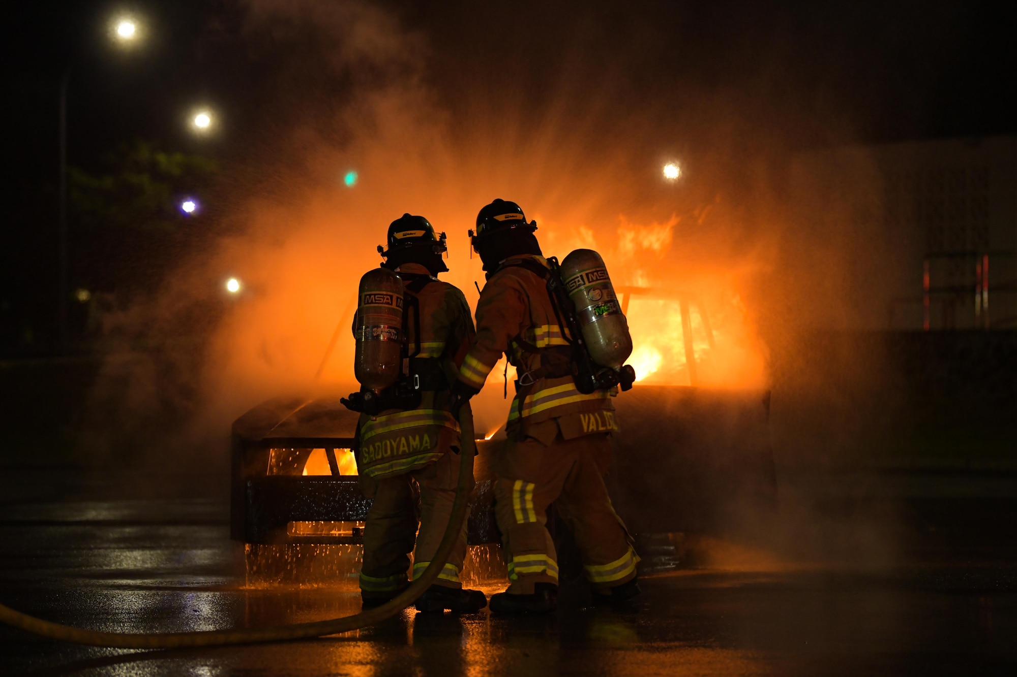 Firefighters extinguish a fire.