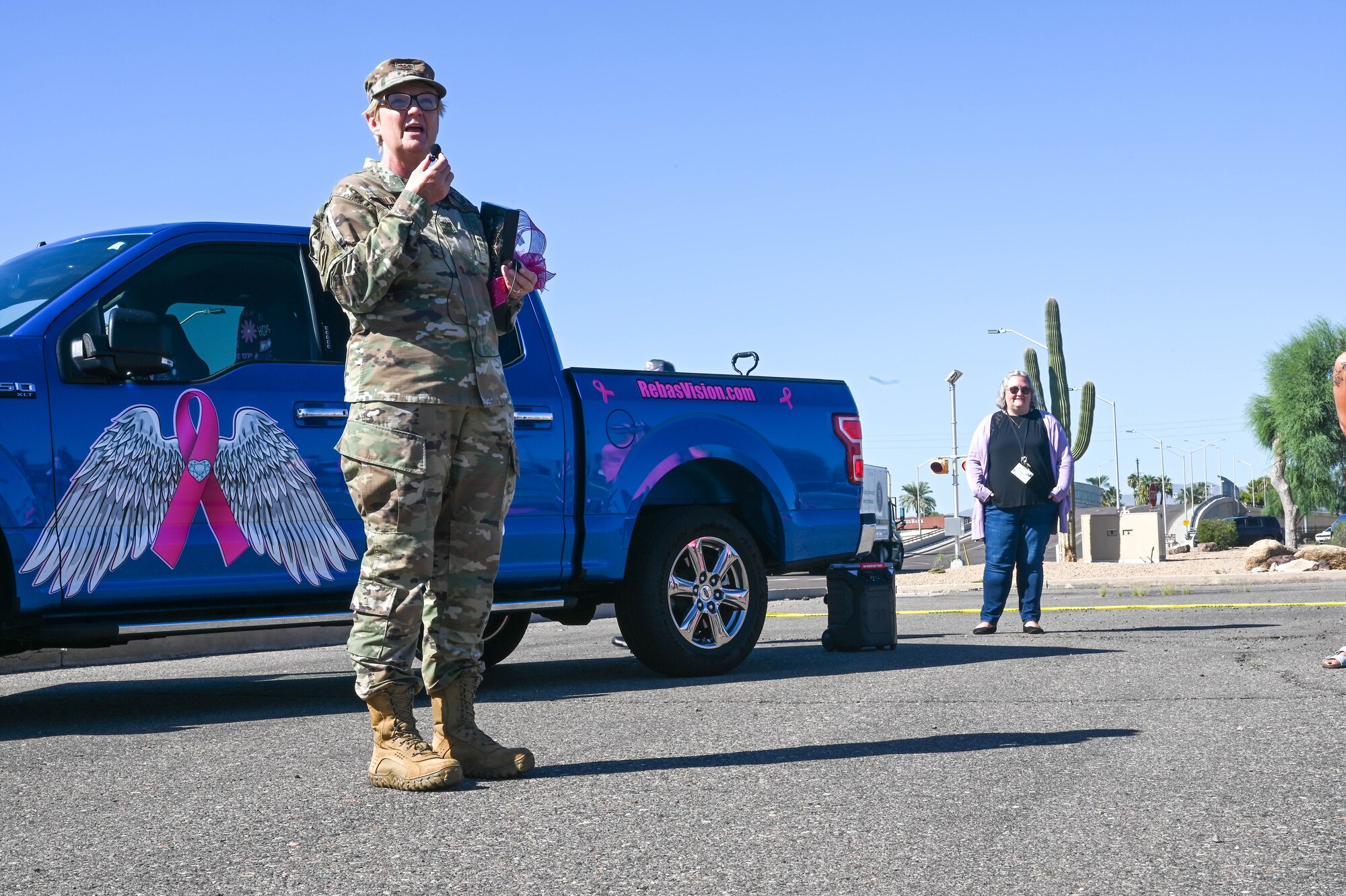 U.S. Air Force Col. Colleen Frohling, 56th Medical Group chief nurse executive, speaks to attendees of a breast cancer awareness event Oct. 5, 2022, at Luke Air Force Base, Arizona.
