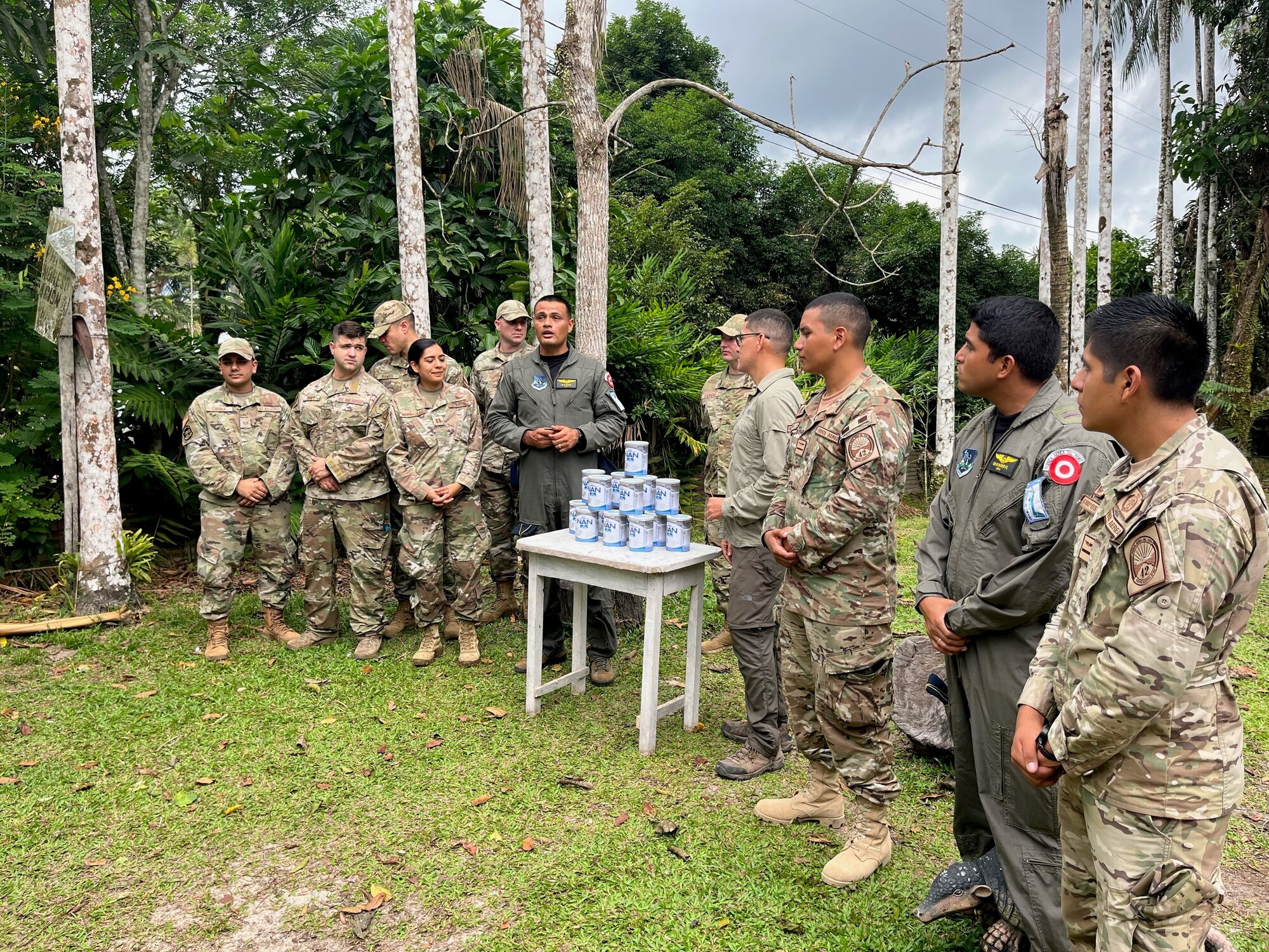 U.S Air Force’s 571st Mobility Support Advisory Squadron advisors stand alongside Fuerza Aérea de Peru (FAP)’s Grupo Aereo N. 42 service members, Sept. 4, 2022, in Base Area Coronel Francisco Secada Vignetta Air Base, Peru. The FAP and USAF spoke about their shared common value and importance of supporting their nation’s most vulnerable species, and for Peru, one animal conservation status that is being threatened is the Amazonian manatee. To help with the conservation efforts of these endangered animals due to illegal hunting, climate change and/or habitat loss, both units teamed up to provide essential landscaping tools and feeding supplies needed to maintain the Amazon Rescue Centers within the local area. (U.S. Air Force photo by Tech. Sgt. Anthony Garcia)