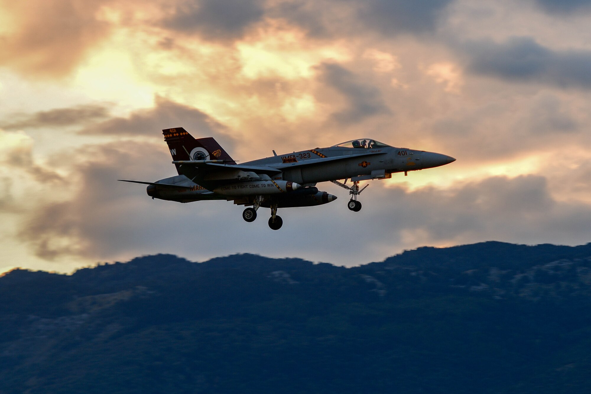 A U.S. Marine Corps F/A-18 Hornet assigned to the Marine Fighter Attack Squadron 323 based out of Marine Corps Air Station Miramar, California, prepares to land at Aviano Air Base, Italy, Sept. 20, 2022. During the training flights, Marines from the VMFA-323 Squadron flew F/A-18s alongside F-16 Fighting Falcon pilots assigned to the 510th Fighter Squadron. (U.S. Air Force photo by Senior Airman Brooke Moeder)