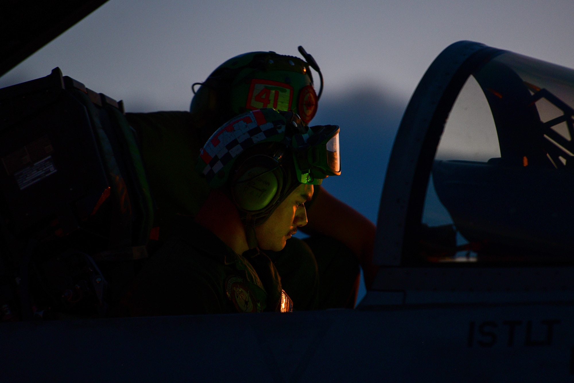 United States Marine Corps F/A-18 fixed-wing aircraft mechanics inspect an F/A-18 Hornet assigned to the Marine Fighter Attack Squadron 323 based out of Marine Corps Air Station Miramar, California, at Aviano Air Base, Italy, Sept. 20, 2022. Fixed-wing aircraft mechanics inspect and maintain aircraft airframes and airframe components as well as perform additional duties relating to flightline operations. (U.S. Air Force photo by Senior Airman Brooke Moeder)