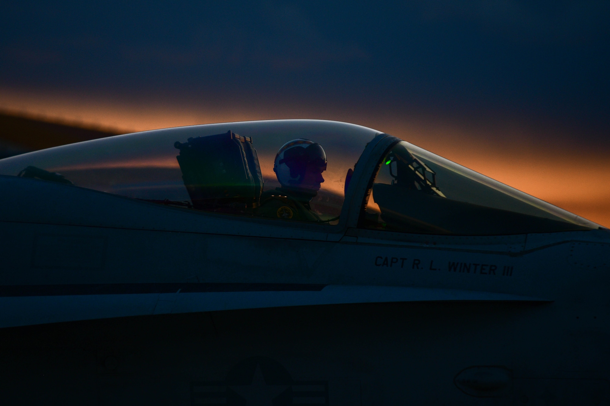 A United States Marine Corps F/A-18 Hornet pilot assigned to the Marine Fighter Attack Squadron 323 based out of Marine Corps Air Station Miramar, California, prepares for a training sortie at Aviano Air Base, Italy, Sept. 20, 2022. The VMFA-323 Squadron integrated with the 510th Fighter Squadron and practiced dogfighting, where one F-16 would be paired with one F-18 and whoever gets "gunned" loses. (U.S. Air Force photo by Senior Airman Brooke Moeder)