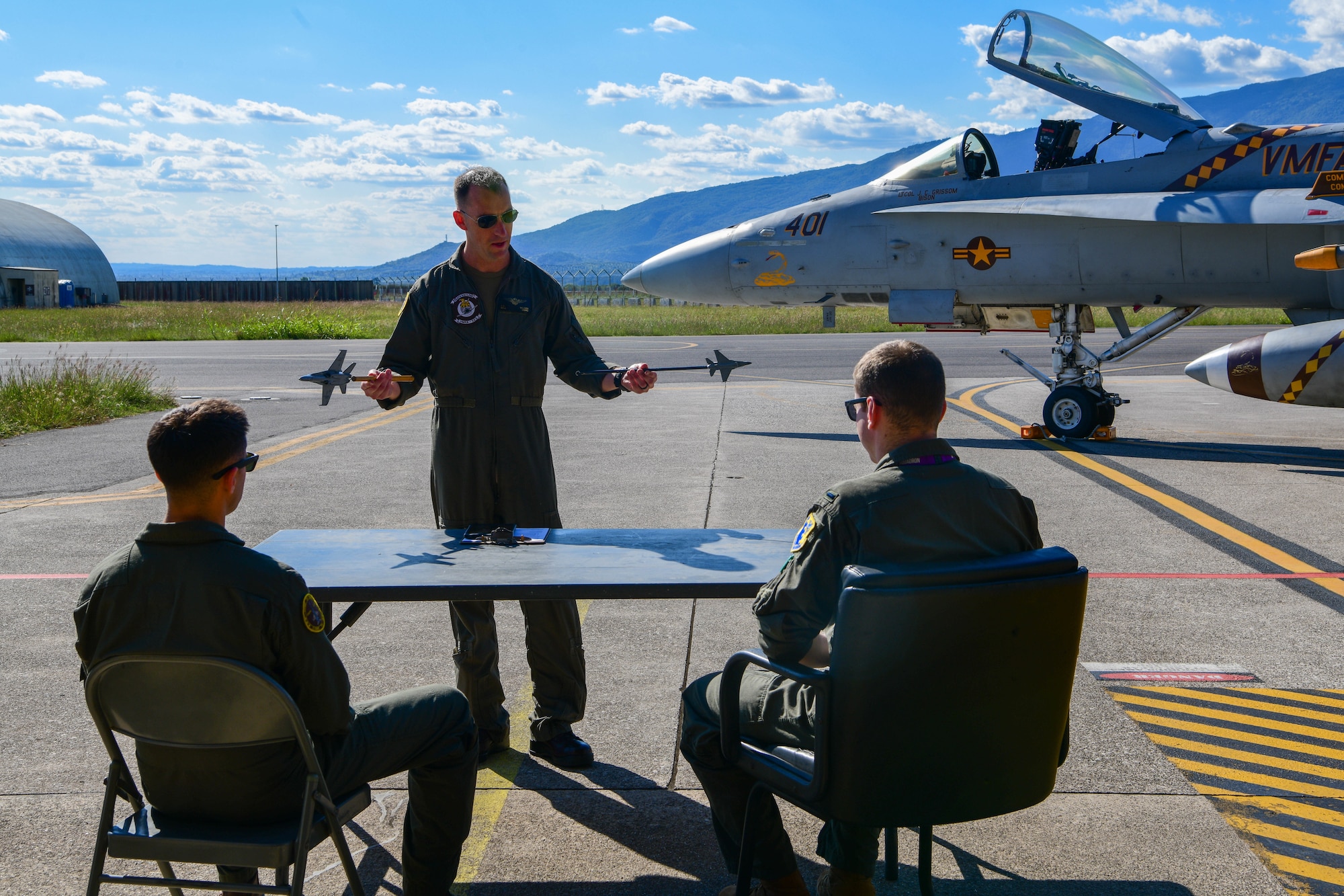 U.S. Marine Corps Maj. Kyle Wilson, Marine Fighter Attack Squadron 323 executive officer, gives a mission brief to pilots at Aviano Air Base, Italy, Sept. 21, 2022. More than 200 U.S. Marines were deployed to Aviano Air Base, Italy, for approximately two months to integrate and train with the 510th FS as part of a dynamic force employment. (U.S. Air Force photo by Senior Airman Brooke Moeder)