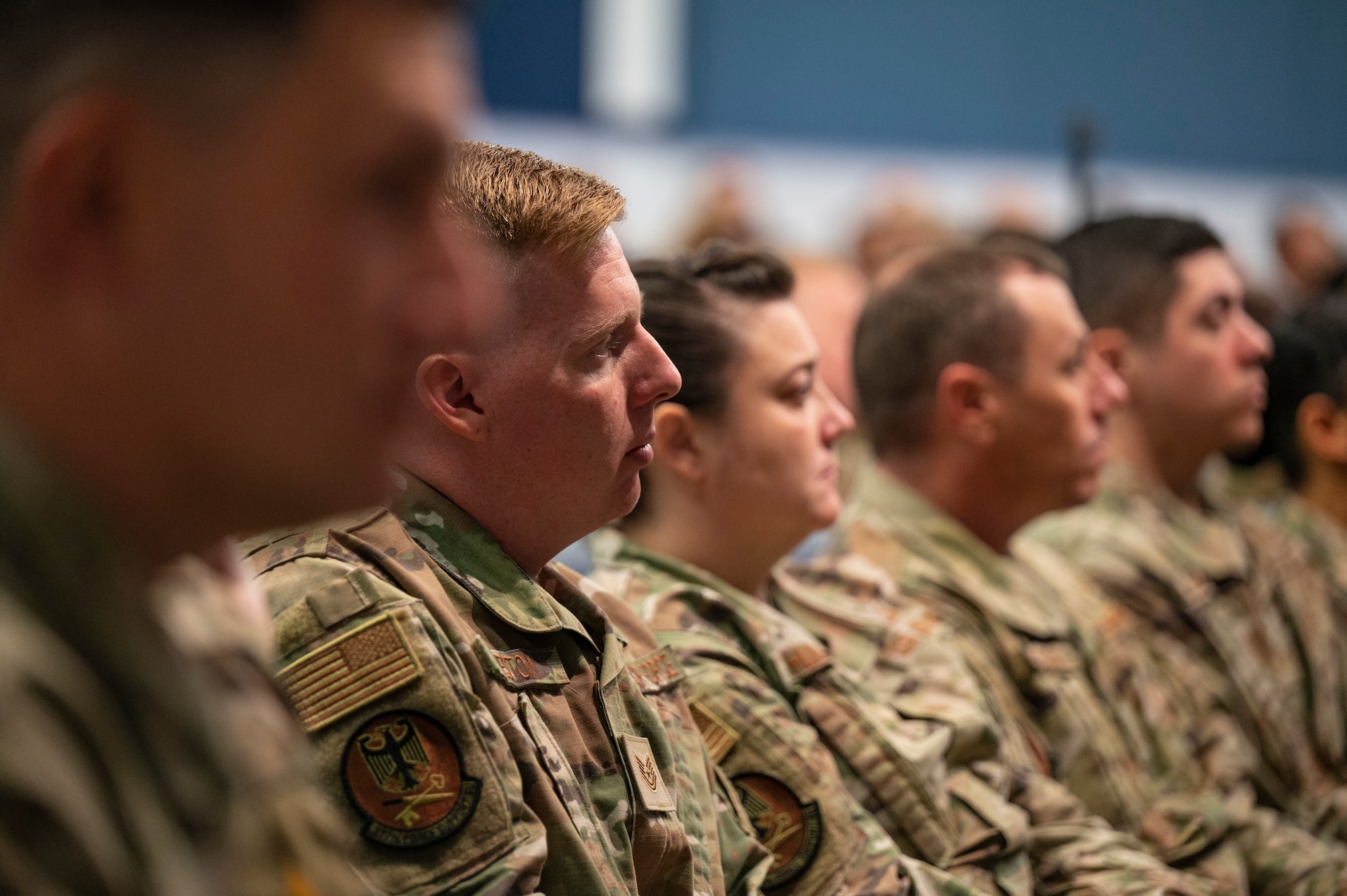 Airman listen at an all-call.
