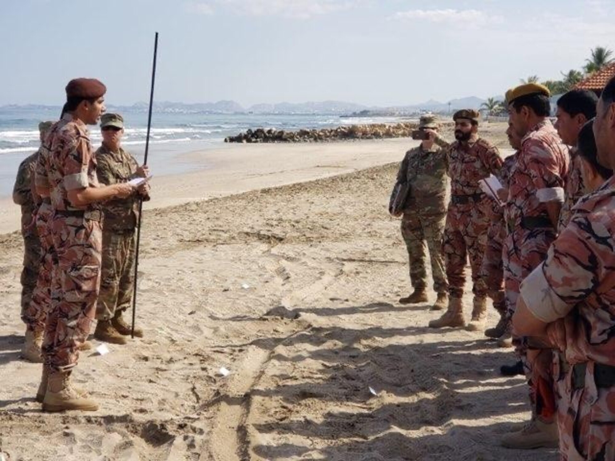 Members of 158th MEB Military Engagement Team 2 observe members of the Sultan of Oman’s Armed Forces in Oman during a subject matter expert exchange briefing. Maj. Gen. Kerry L. Muehlenbeck, director of Arizona’s Department of Emergency and Military Affairs, announced a new partnership between the Sultanate of Oman and the Arizona National Guard Oct. 13, 2022, through the Department of Defense National Guard Bureau State Partnership Program.
