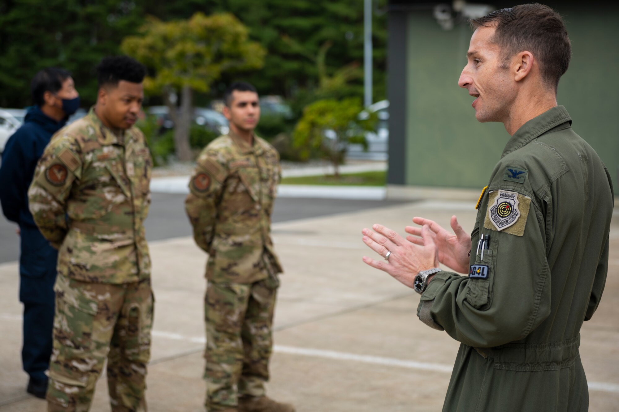 35th Fighter Wing commander addressing other Airmen during the fire prevention week proclamation signing.