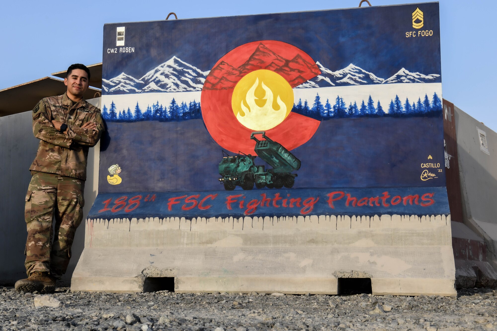 U.S. Army Sgt. Anthony Castillo, a mobility specialist assigned to the 3-157th Field Artillery unit and Colorado National Guardsmen, paints ten murals across Al Dhafra Air Base.