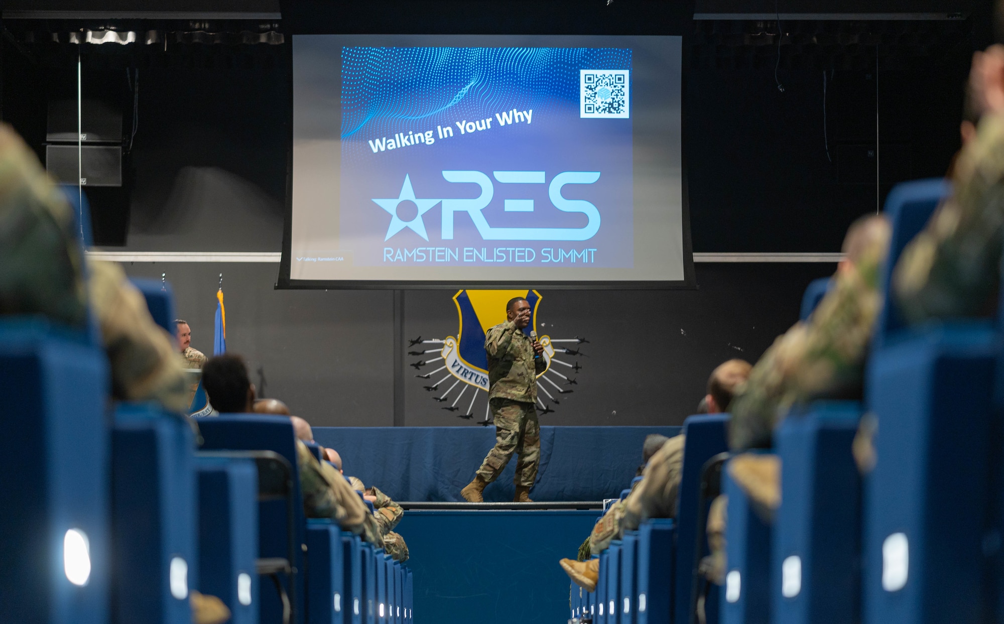 speaker talks to audience