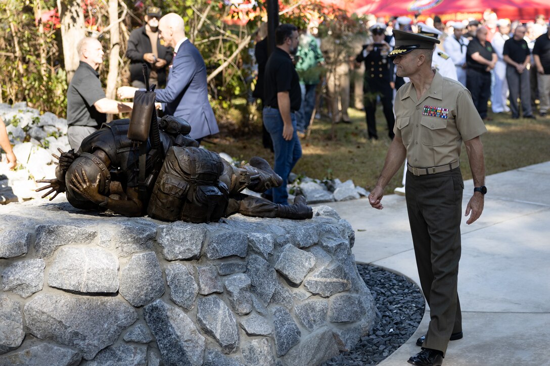 U.S. Marine Corps Brig. Gen. Andrew M. Neibel, commanding general of Marine Corps Installations East-Marine Corps Base Camp Lejeune, tours the newly unveiled Corpsman Memorial following the Corpsmen Memorial Dedication Ceremony at Lejeune Memorial Gardens in Jacksonville, North Carolina, Oct. 12, 2022. The Corpsmen Memorial is dedicated to honor all those who served alongside the Marines as Fleet Marine Force Corpsmen in recognition of the duties performed and bonds forged in conflict. (U.S. Marine Corps photo by Cpl. Antonino Mazzamuto)