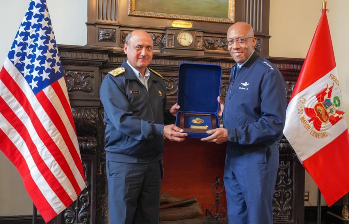 Peruvian Air Force Commanding General Alfonso Javier Artadi Saletti presents U.S. Air Force Chief of Staff Gen. CQ Brown, Jr., with a token of the close and enduring cooperation between the U.S. and Peruvian Air Forces during Brown’s visit to Peru Oct. 11-12, 2022. During the visit, both sides discussed Peru’s defense modernization plans, opportunities for additional defense cooperation, and the need to create a collaborative environment to share information and ensure future interoperability. (Photo courtesy of the Peruvian Air Force)
