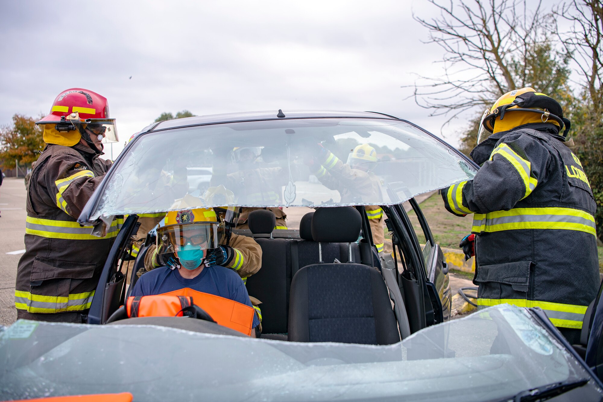 Firefighters from the 423d Civil Engineer Squadron, lift the upper section of a vehicle during a rescue demonstration at RAF Alconbury, England, Oct. 12, 2022. The demonstration was part of Fire Prevention Week in which firefighters from the 423d CES educated Airmen and dependents on proper fire safety habits. (U.S. Air Force photo by Staff Sgt. Eugene Oliver)