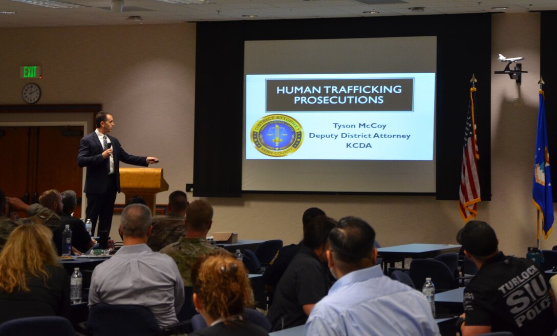 Tyson McCoy, Kern County California deputy district attorney briefs attendees about Human Trafficking Prosecutions during the inaugural law enforcement symposium conducted by OSI Detachment 111, at Edwards Air Force Base, Calif., Sept. 15, 2022. (Photo by OSI Det. 111)