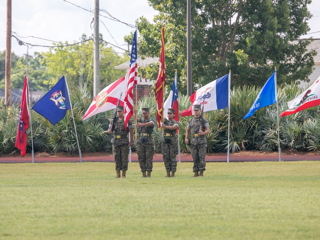 A U.S. Marine Corps color guard participates in the Headquarters Battalion/Marine Corps Support Facility New Orleans change of command ceremony at Marine Corps Support Facility New Orleans, June 2, 2022. The change of command ceremony represents the official passing of authority from the outgoing leader to the incoming leader. (U.S. Marine Corps photo by Lance Cpl. Mitchell Collyer)
