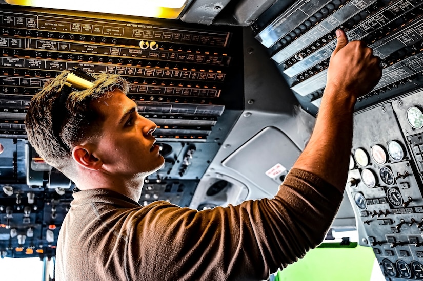 U.S. Air Force Senior Airman Austin Sondergard, 605th Aircraft Maintenance Squadron crew chief, performs pre-flight checks on a KC-10 extender at Joint Base McGuire-Dix-Lakehurst, N.J. on Oct. 10, 2022. Sondergard received brain surgery to remove an arteriovenous malformation, and later suffered losses to both memory, speech, and motor skills due to a stroke. Recovered, Sondergard returned to his duties as a Crew Chief and hobby as an avid powerlifter.