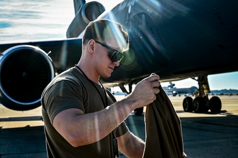 U.S. Air Force Senior Airman Austin Sondergard, 605th Aircraft Maintenance Squadron crew chief, performs pre-flight checks on a KC-10 extender at Joint Base McGuire-Dix-Lakehurst, N.J. on Oct. 10, 2022. Sondergard received brain surgery to remove an arteriovenous malformation, and later suffered losses to both memory, speech, and motor skills due to a stroke. Recovered, Sondergard returned to his duties as a Crew Chief and hobby as an avid powerlifter.