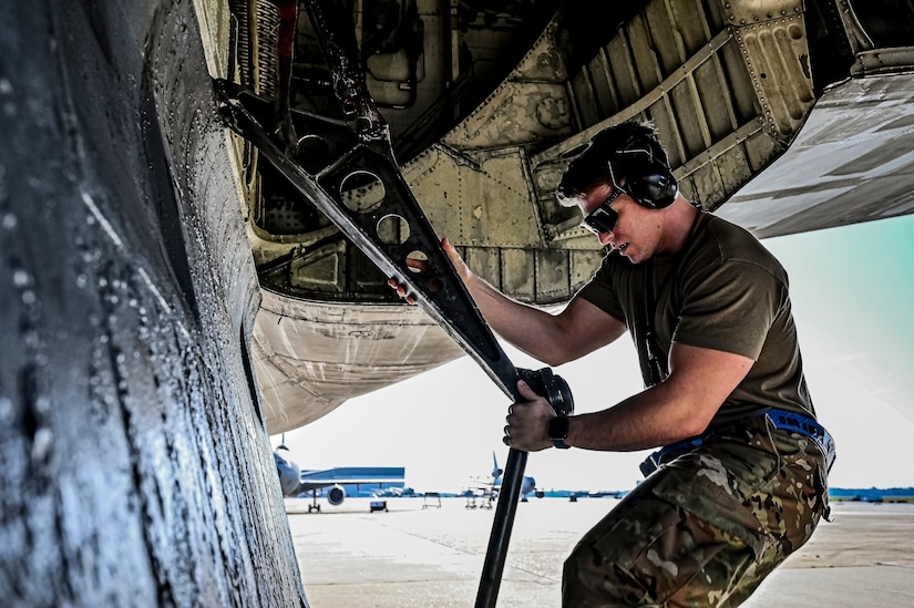 U.S. Air Force Senior Airman Austin Sondergard, 605th Aircraft Maintenance Squadron crew chief, performs pre-flight checks on a KC-10 extender at Joint Base McGuire-Dix-Lakehurst, N.J. on Oct. 10, 2022. Sondergard received brain surgery to remove an arteriovenous malformation, and later suffered losses to both memory, speech, and motor skills due to a stroke. Recovered, Sondergard returned to his duties as a Crew Chief and hobby as an avid powerlifter.