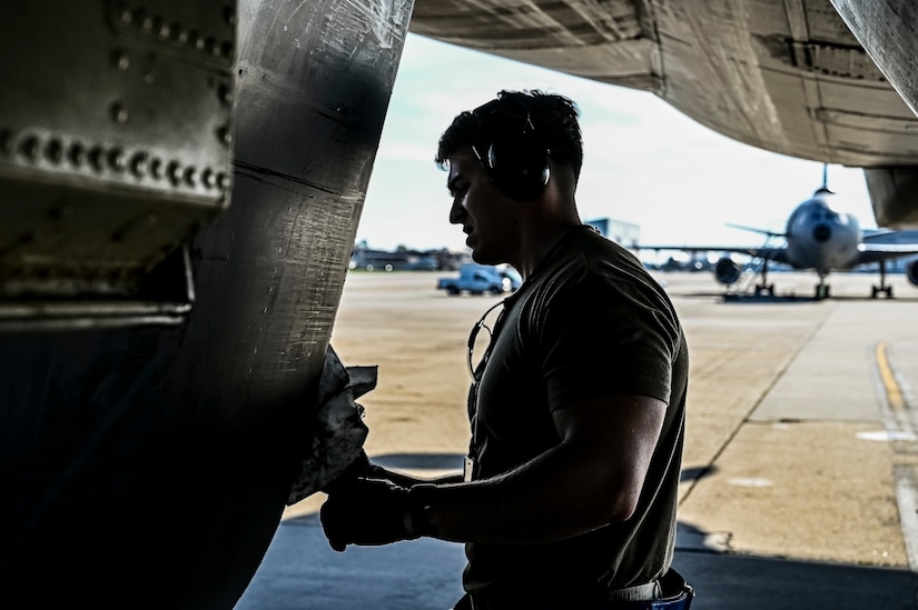 U.S. Air Force Senior Airman Austin Sondergard, 605th Aircraft Maintenance Squadron crew chief, performs pre-flight checks on a KC-10 extender at Joint Base McGuire-Dix-Lakehurst, N.J. on Oct. 10, 2022. Sondergard received brain surgery to remove an arteriovenous malformation, and later suffered losses to both memory, speech, and motor skills due to a stroke. Recovered, Sondergard returned to his duties as a Crew Chief and hobby as an avid powerlifter.
