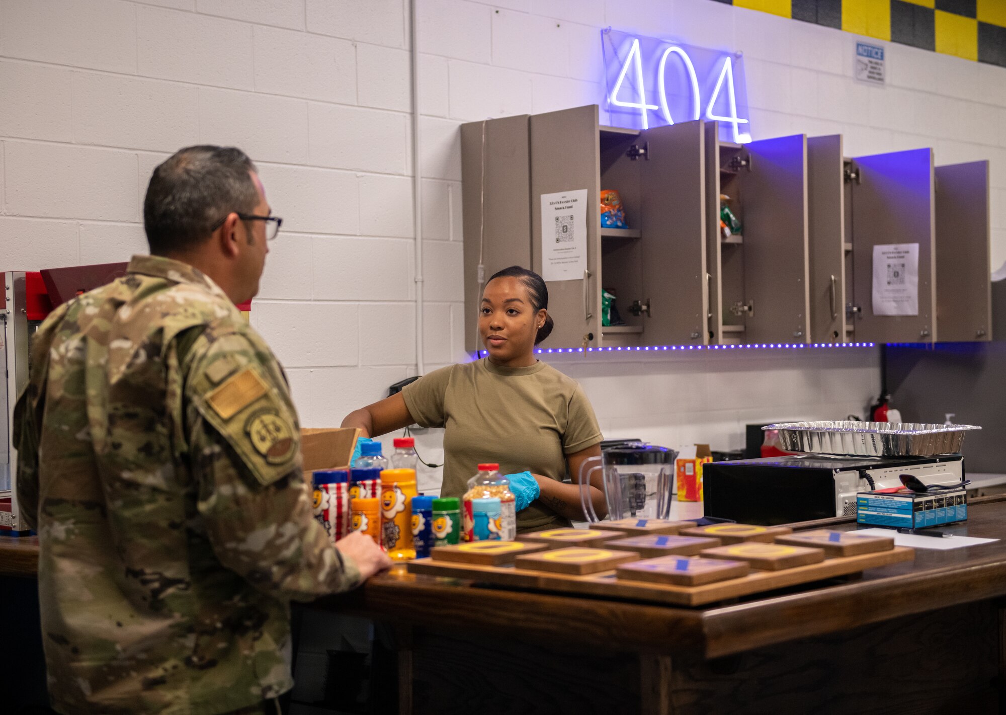 Airmen talk with each other