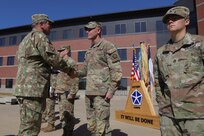 The Chief of the Romanian Land Forces Maj. Gen. Iulian Berdilă shakes hands with U.S. Army Master Sgt. Joshua J. Gendron during an awards ceremony at V Corps’ main headquarters in Fort Knox, Kentucky, Oct. 13, 2022. During his visit , Berdilă briefed leaders, met with Soldiers and presented awards to Victory Corps personnel for their contributions to the strategic American-Romanian partnership. (U.S. Army photo by Spc. Javen Owens)