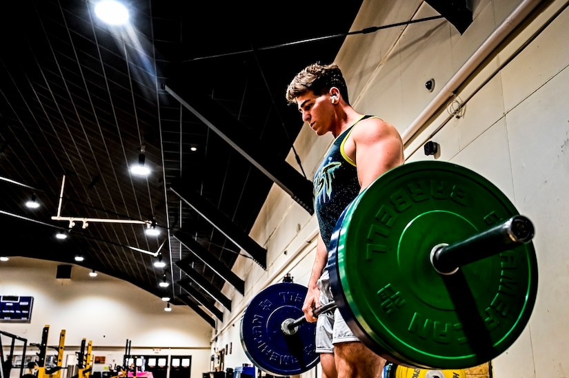 U.S. Air Force Senior Airman Austin Sondergard, 605th Aircraft Maintenance Squadron crew chief, exercises at the Griffith Field House at Joint Base McGuire-Dix-Lakehurst, N.J. on Oct. 10, 2022. Sondergard received brain surgery to remove an arteriovenous malformation, and later suffered losses to both memory, speech, and motor skills due to a stroke. Recovered, Sondergard returned to his duties as a Crew Chief and hobby as an avid powerlifter.