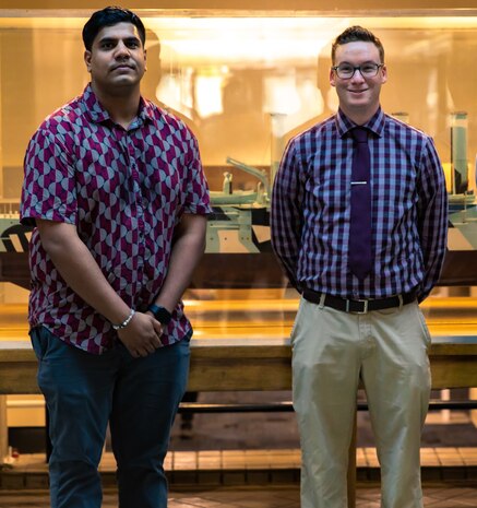 Two of the Naval Surface Warfare Center, Philadelphia Division employees who received 2022 Warfare Center Awards gathered at NSWCPD on Aug. 2, 2022. Rahul George (left), is a member of the “CVN 78 Full Ship Shock Trial Team” that was awarded the John C. Mickey Award for Collaboration. Nolan LaFountain (right) was awarded the Technical Support Services Award. (U.S. Navy Photo by Jay Butterbaugh/Released)