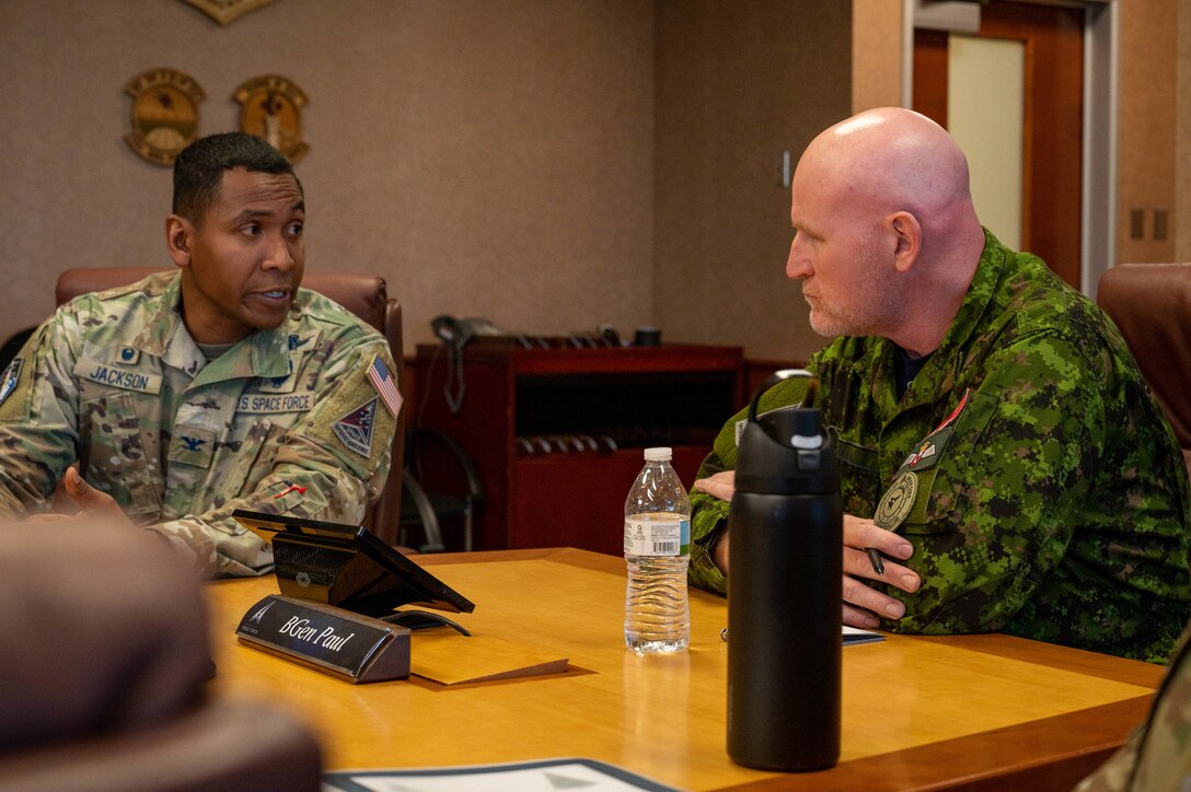 From left to right, Col. Marcus Jackson, Space Base Delta 2 commander, sits alongside Brig. Gen. Kyle Paul, Deputy Commanding General, Transformation, Space Operations Command during a conference at Buckley Space Force Base, Colo., Oct. 11, 2022. The two individuals shared knowledge and ideas on the building and structuring of the current U.S. Space Force, as well as achievements SBD2 has made, alongside its mission partners. (U.S. Space Force photo by Airman 1st Class Shaun Combs)
From left to right, Col. Marcus Jackson, Space Base Delta 2 commander, sits alongside Brig. Gen. Kyle Paul, Deputy Commanding General, Transformation, Space Operations Command during a conference at Buckley Space Force Base, Colo., Oct. 11, 2022. The two individuals shared knowledge and ideas on the building and structuring of the current U.S. Space Force, as well as achievements SBD2 has made, alongside its mission partners. (U.S. Space Force photo by Airman 1st Class Shaun Combs)