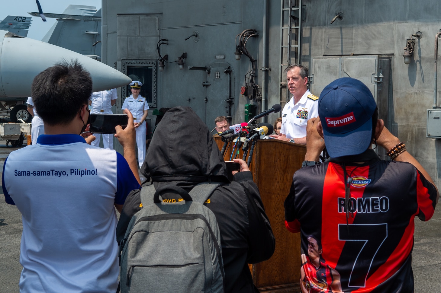 221014-N-IG750-1023 MANILA BAY (Oct. 14, 2022) Rear Adm. Buzz Donnelly, Commander, Carrier Strike Group (CSG) 5, speaks at a press conference on the flight deck of the U.S. Navy’s only forward-deployed aircraft carrier, USS Ronald Reagan (CVN 76), as the ship is anchored in Manila Bay, Philippines, Oct. 14. Ronald Reagan, the flagship of CSG 5 provides a combat-ready force that protects and defends the United States, and supports alliances, partnerships and collective maritime interests in the Indo-Pacific region. (U.S. Navy photo by Mass Communication Specialist 2nd Class Caleb Dyal)