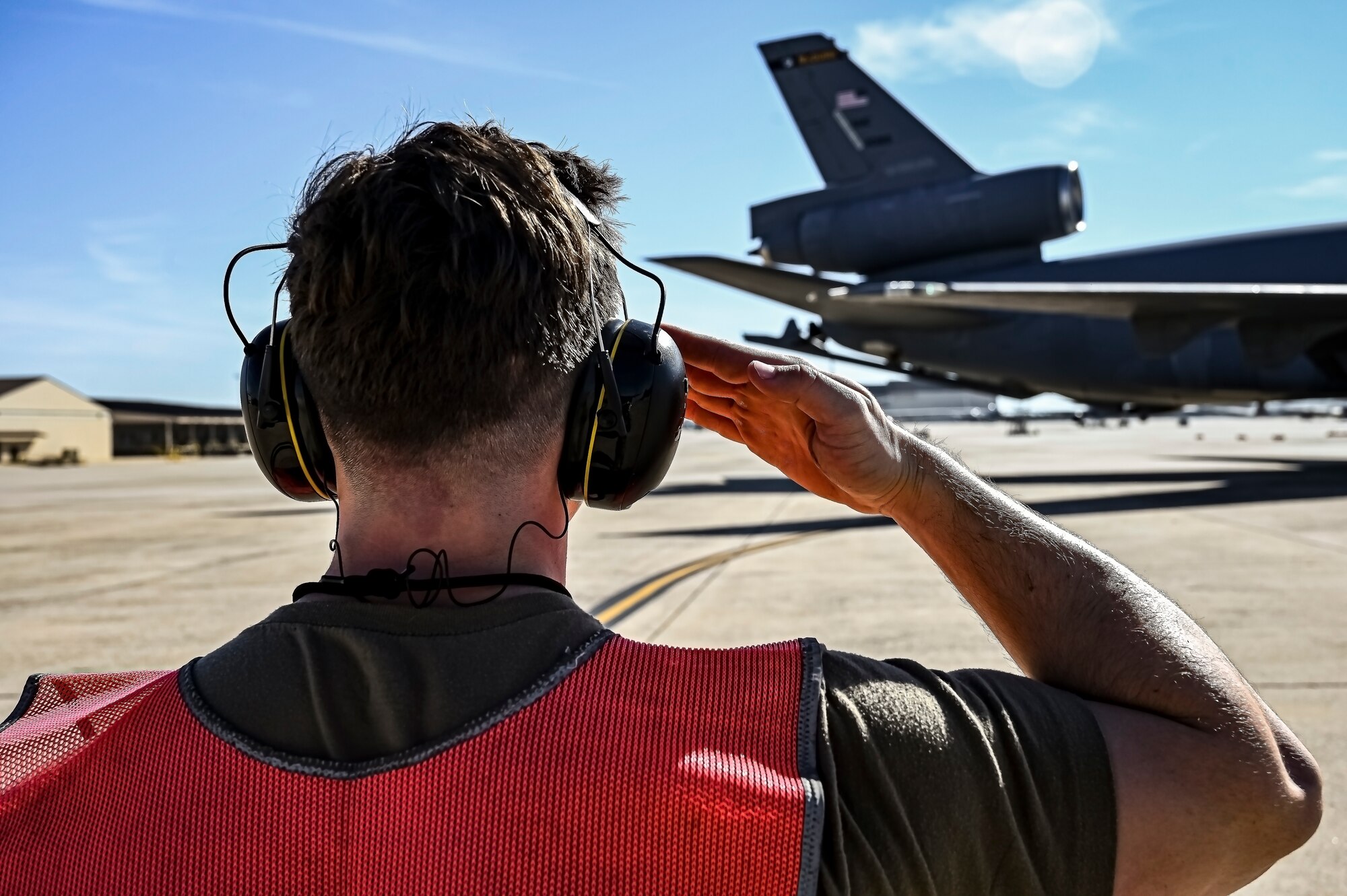 U.S. Air Force Senior Airman Austin Sondergard, 605th Aircraft Maintenance Squadron crew chief, performs pre-flight checks on a KC-10 extender at Joint Base McGuire-Dix-Lakehurst, N.J. on Oct. 10, 2022. Sondergard received brain surgery to remove an arteriovenous malformation, and later suffered losses to both memory, speech, and motor skills due to a stroke. Recovered, Sondergard returned to his duties as a Crew Chief and hobby as an avid powerlifter.