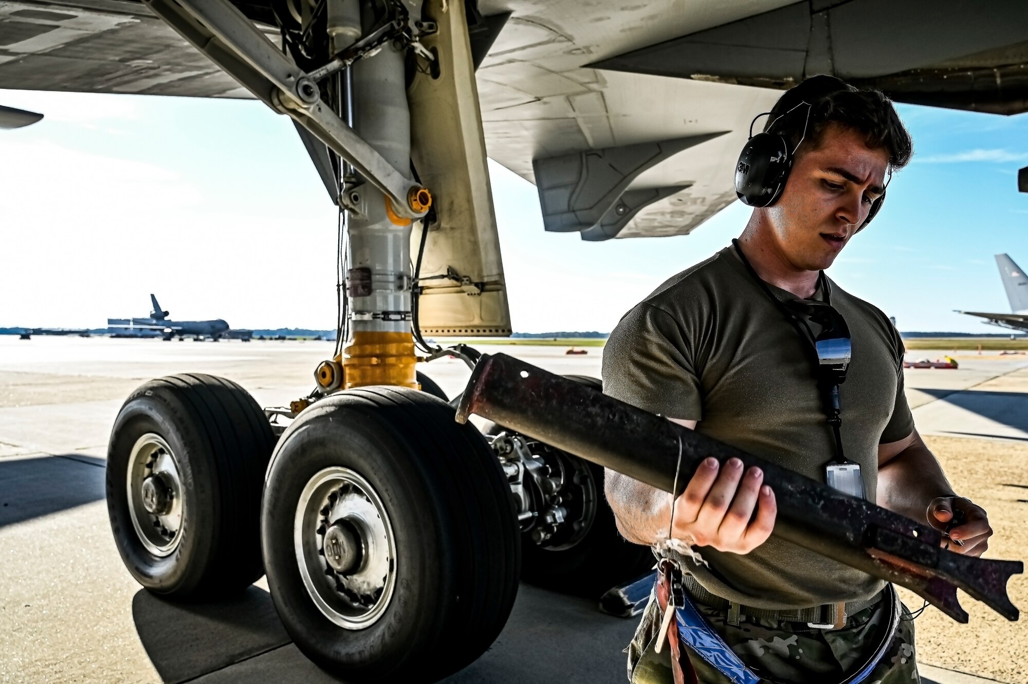 U.S. Air Force Senior Airman Austin Sondergard, 605th Aircraft Maintenance Squadron crew chief, performs pre-flight checks on a KC-10 extender at Joint Base McGuire-Dix-Lakehurst, N.J. on Oct. 10, 2022. Sondergard received brain surgery to remove an arteriovenous malformation, and later suffered losses to both memory, speech, and motor skills due to a stroke. Recovered, Sondergard returned to his duties as a Crew Chief and hobby as an avid powerlifter.
