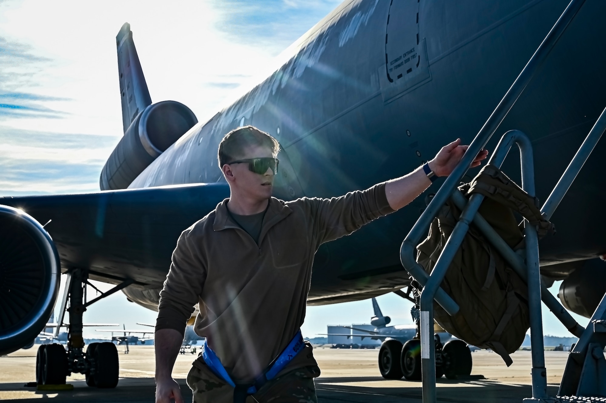 U.S. Air Force Senior Airman Austin Sondergard, 605th Aircraft Maintenance Squadron crew chief, performs pre-flight checks on a KC-10 extender at Joint Base McGuire-Dix-Lakehurst, N.J. on Oct. 10, 2022. Sondergard received brain surgery to remove an arteriovenous malformation, and later suffered losses to both memory, speech, and motor skills due to a stroke. Recovered, Sondergard returned to his duties as a Crew Chief and hobby as an avid powerlifter.