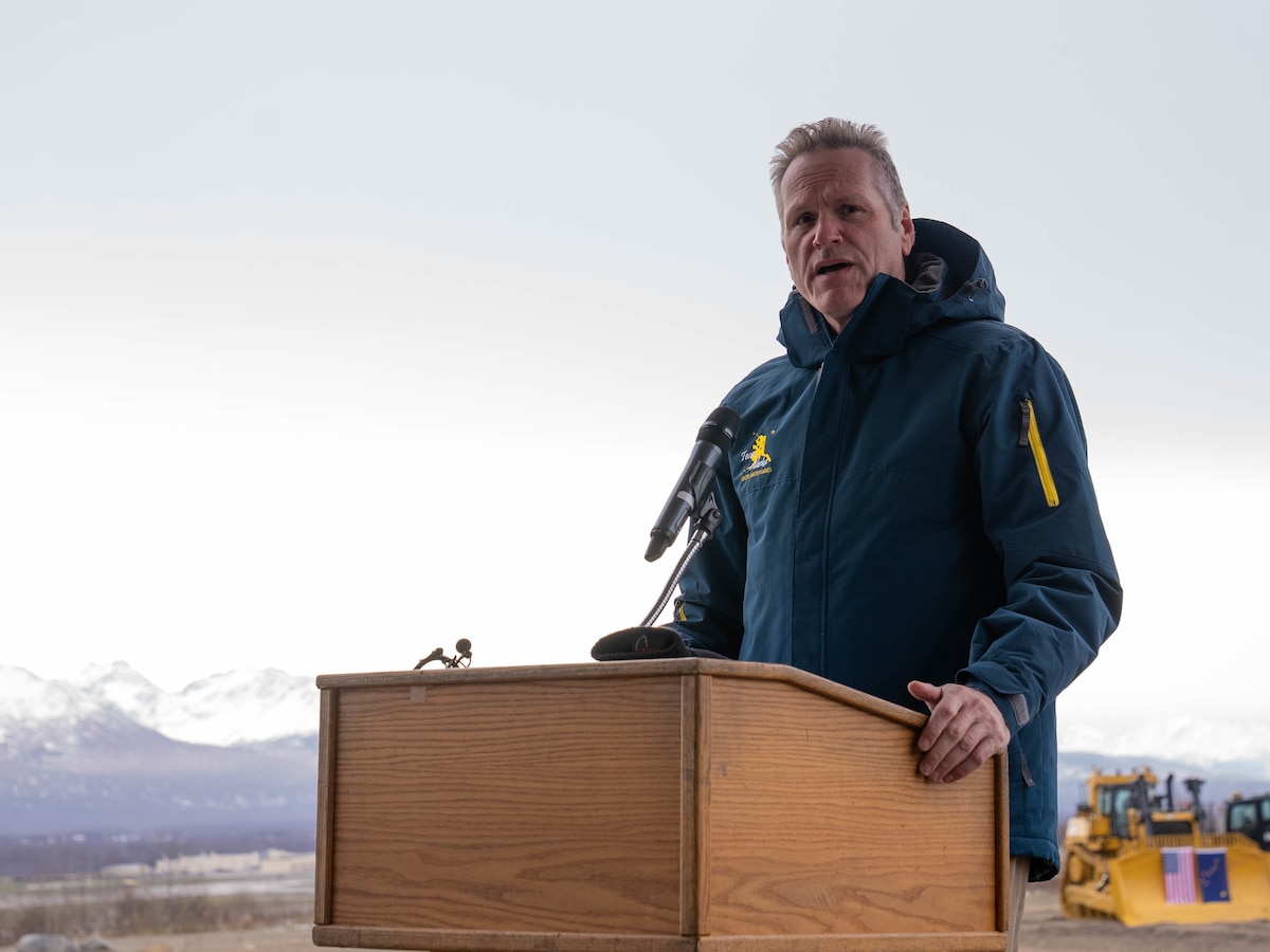Gov. Mike Dunleavy talks at an event