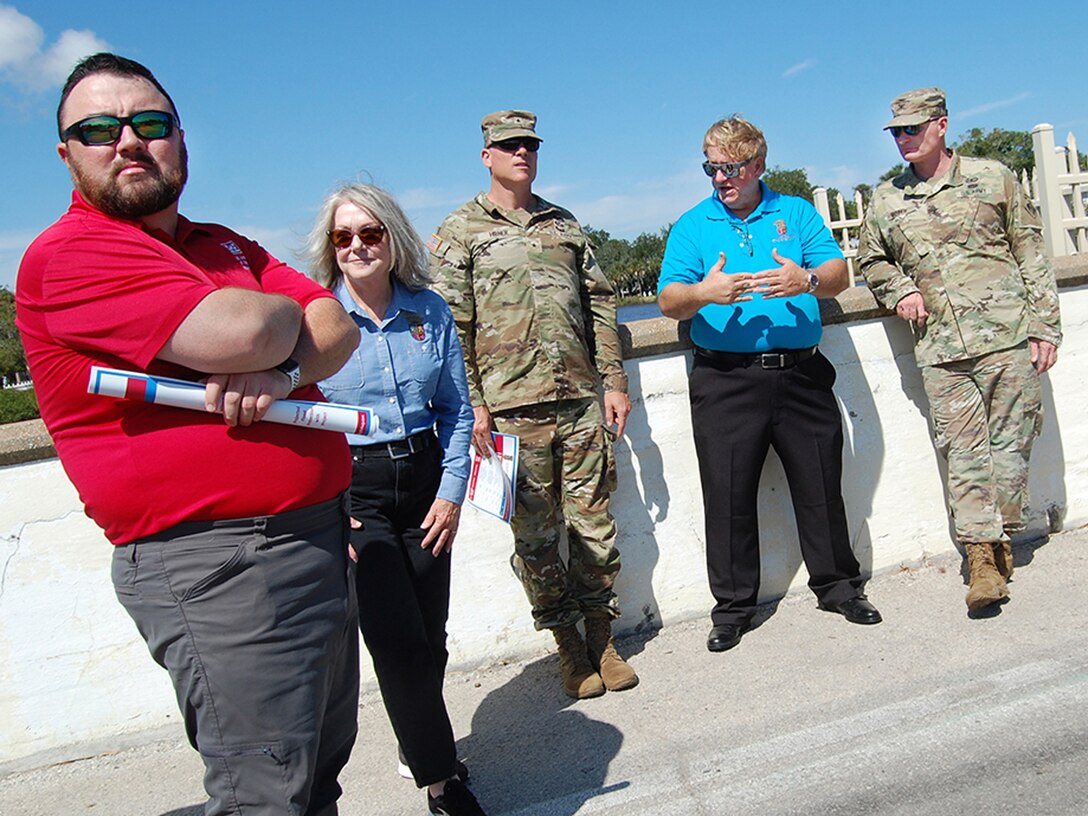 PHOTO DETAILS  /   DOWNLOAD HI-RES 1 of 3
USACE South Atlantic Division Commander, Brig. Gen. Daniel Hibner (left), and St. Johns Co. commissioner, Henry Dean, discuss coastal storm risk management alternatives with a joint staff delegation at Vilano Beach, Florida, Oct. 9, 2022.