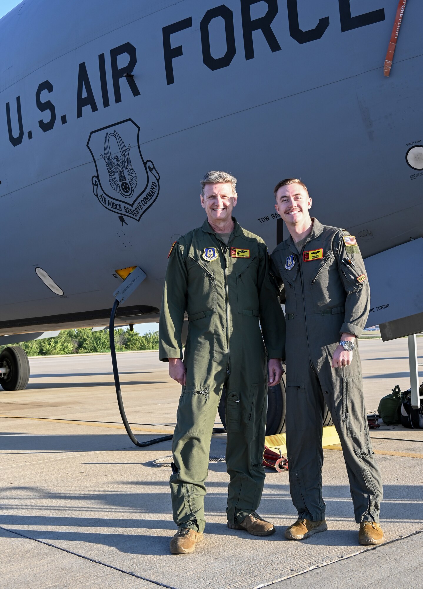 Col. Ken Humphrey, 507th Operations group commander, is joined by his son, 2nd Lt. Kennedy Humphrey, 71st Student Squadron student pilot, during his final flight as an 507th Air Refueling Wing Okie Sept. 29, 2022, Tinker Air Force Base, Oklahoma. 2nd Lt. Kennedy Humphrey will become a KC-135 pilot with the Okies at the conclusion of his training. Kennedy will be the third generation in his family to become an Okie. (U.S. Air Force photo by 2nd Lt. Mary Begy)