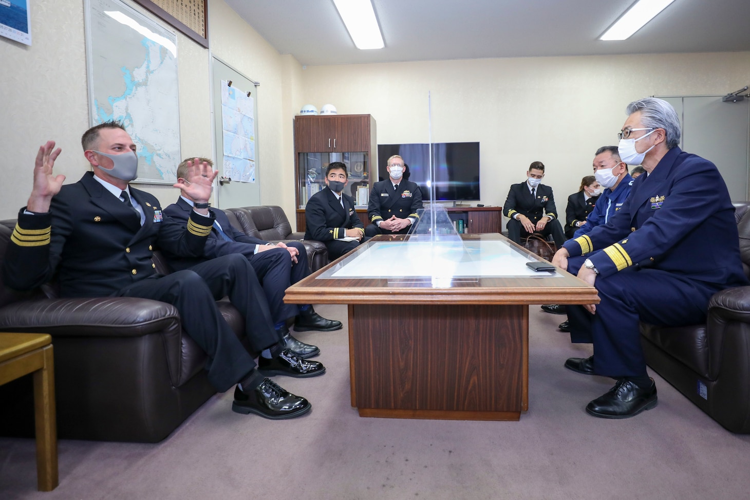 HAKODATE, Japan (Oct. 7, 2022) Cmdr. Marcus Seeger, commanding officer of Arleigh Burke-class guided-missile destroyer USS Benfold (DDG 65), meets with Japan Coast Guard Branch Chief Ikegami Katsuhiro and other members of the Japan Coast Guard during a scheduled port visit, Oct. 7. U.S. Consulate General Sapporo Principal Officer Mark Wuebbels joined the meetings. Benfold is assigned to Commander, Task Force 71/Destroyer Squadron (DESRON) 15, the Navy’s largest forward-deployed DESRON and the U.S. 7th Fleet’s principal surface force. (U.S. Navy photo by Mass Communication Specialist 2nd Class Arthur Rosen)