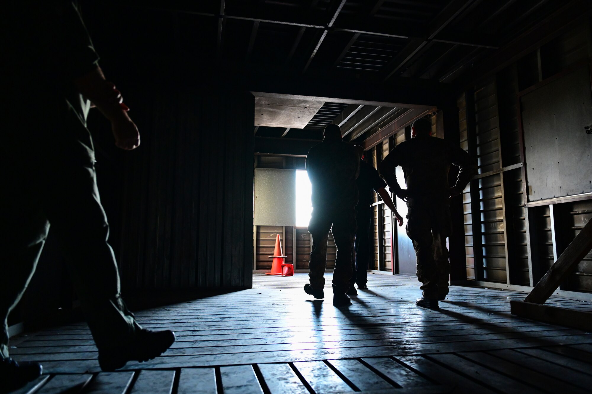 U.S. Air Force, Italian, and Slovenian air force firefighters tour a fire training building during their visit to Aviano Air Base, Italy, Oct. 12, 2022. The tour was held prior to a live fire training demonstration to showcase 31st Fighter Wing capabilities. (U.S. Air Force photo by Senior Airman Thomas S. Keisler IV)