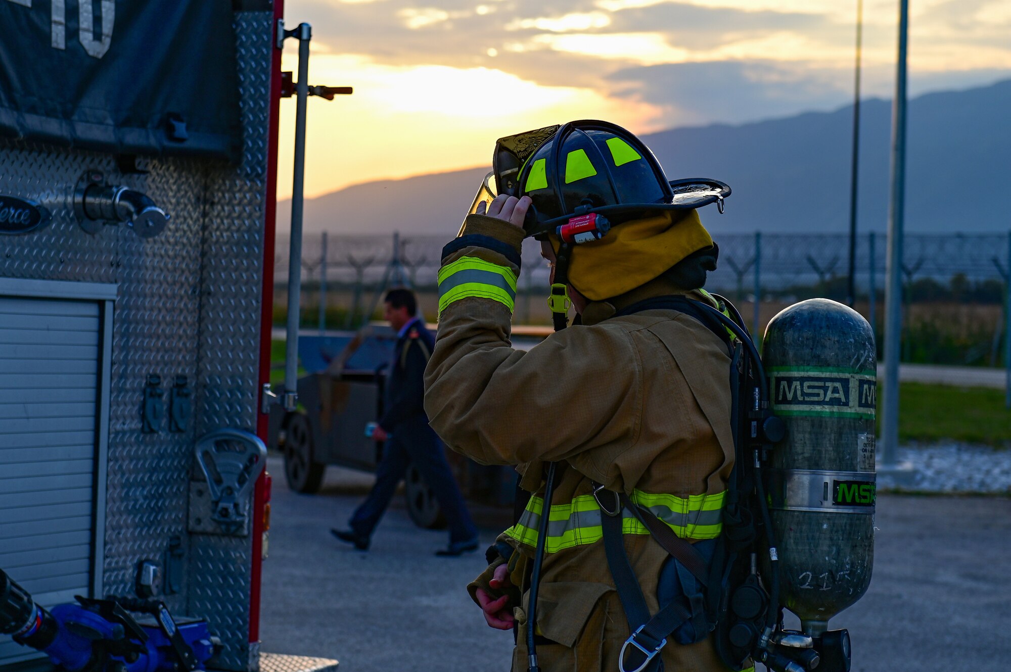 A U.S. Air Force firefighter with the 31st Civil Engineer Squadron prepares for a live fire exercise during the annual Fire Prevention Week at Aviano Air Base, Italy, Oct. 12, 2022. The live fire exercise was part of this year’s Fire Prevention Week. Fire Prevention Week is designed to inform people on how to stay safe in the event of a fire. (U.S. Air Force photo by Senior Airman Thomas S. Keisler IV)