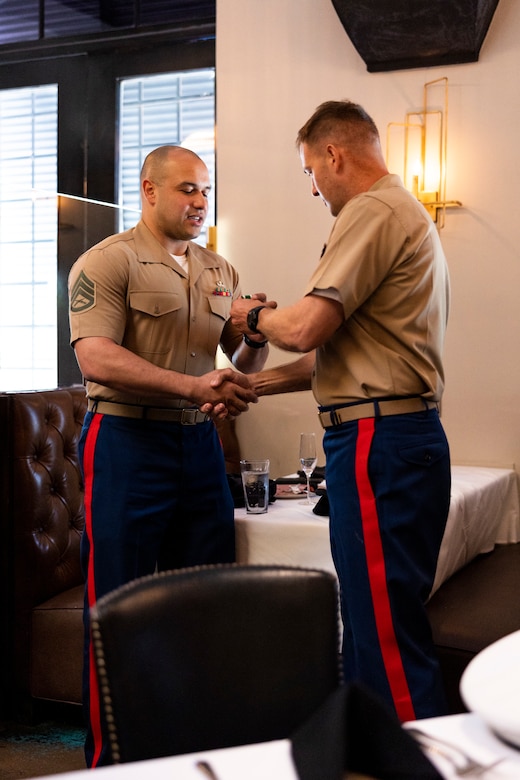U.S. Marine Corps Colonel Warren C. Cook Jr., Commanding Officer of the Marine Corps 8th District, praises and awards Staff Sergeant Robert Simms the Navy & Marine Corps Commendation Medal on Sept. 30, 2022 for his valiant efforts in Marine Corps Recruiting Command (MCRC). 



SSgt. Simms contracted 101 enlisted individuals into the Marine Corps as a canvassing recruiter of Recruiting Sub Station Mesquite. This achievement recongnizes him as a “Centurion” in the recruiting field and earned him a custom helm given to him by the Recruiting Station Dallas Command. (U.S. Marine Corps photo by Sgt. Webster Rison)