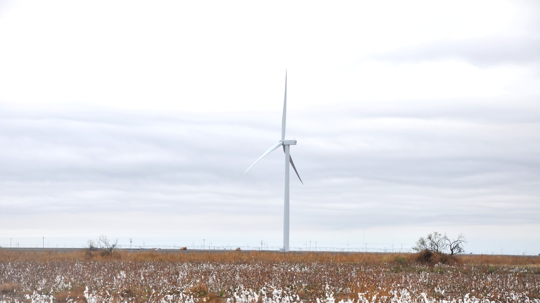 a wind turbine in a field