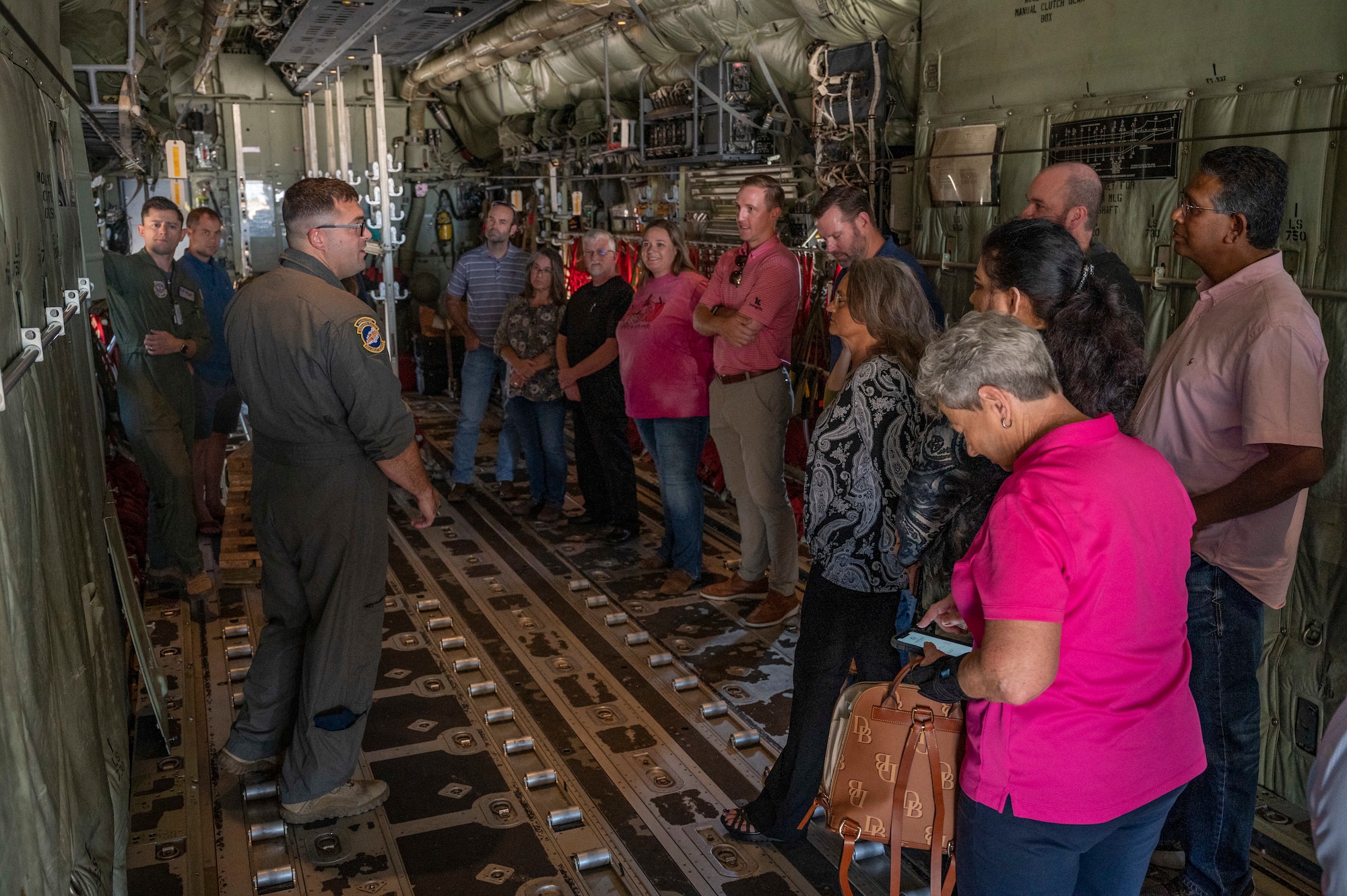 Abilene staff members load into a C-130J Super Hercules to learn more about the plane at Dyess Air Force Base, Texas, Oct. 14, 2022. The medical provider collaboration tour helped bolster partner relationships between the Dyess and local medical community. (U.S. Air Force photo by Senior Airman Josiah Brown)