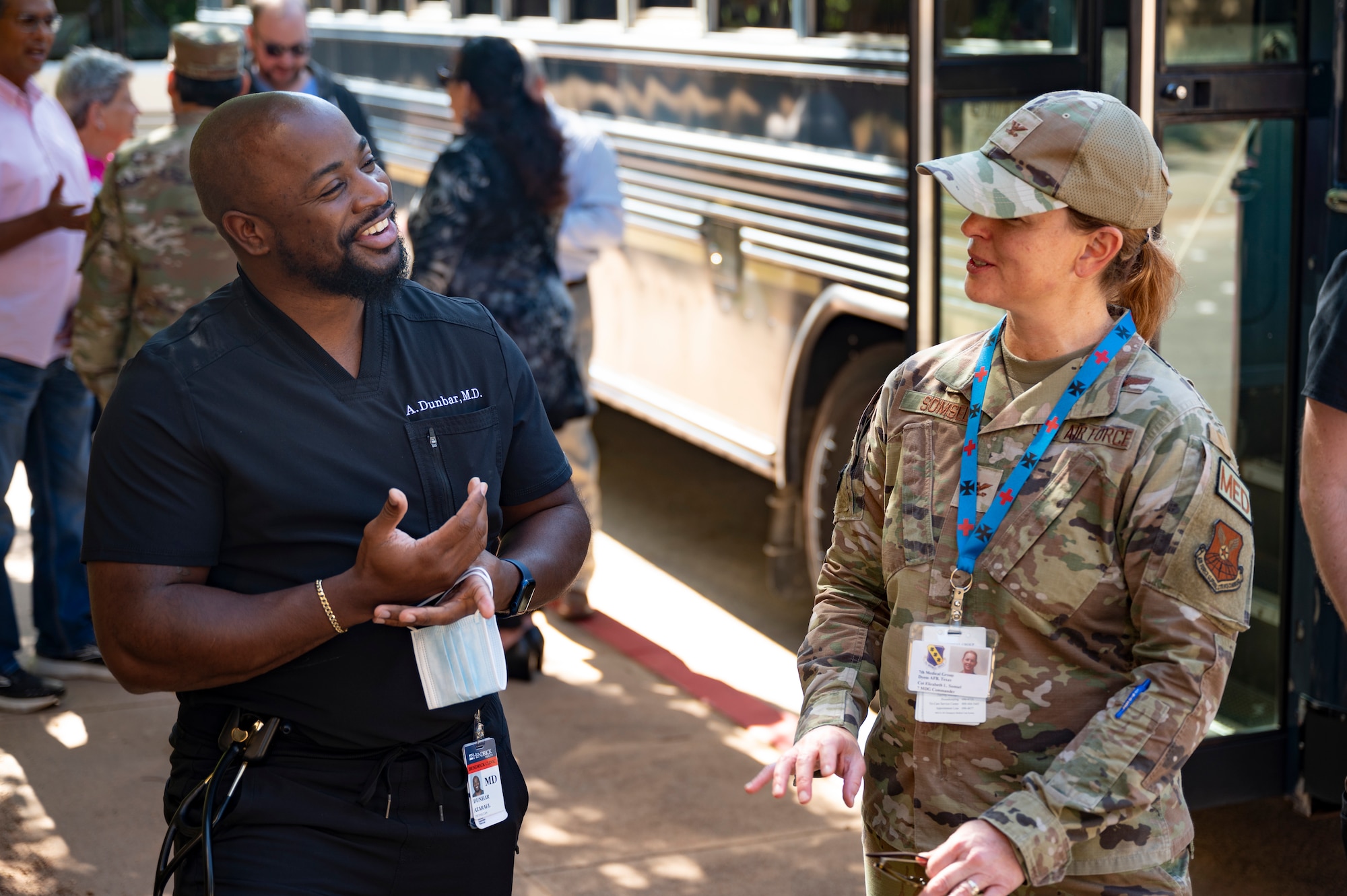 An Abilene staff member talks to Col Elizabeth Somsel, commander of the 7th Medical Group at Dyess Air Force Base, Texas, Oct. 14, 2022. The 7th Medical Group invited approximately 150 medical staff and providers from the local community to connect them with the unique Lift and Strike mission-set that they are supporting. (U.S. Air Force photo by Senior Airman Josiah Brown)