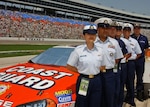 FORT WORTH, Texas (Apr. 3, 2004)--U.S. Coast Guard recruiters from Recruiting Offices Houston, Dallas and San Antonio, Texas, help in supporting Justin Labonte's first race, the O'Reilly 300 at the Texas Motor Speedway, in the new Team Coast Guard Racing/Labonte Motorsports #44 "Shield of Freedom" NASCAR Dodge April 3, 2004.