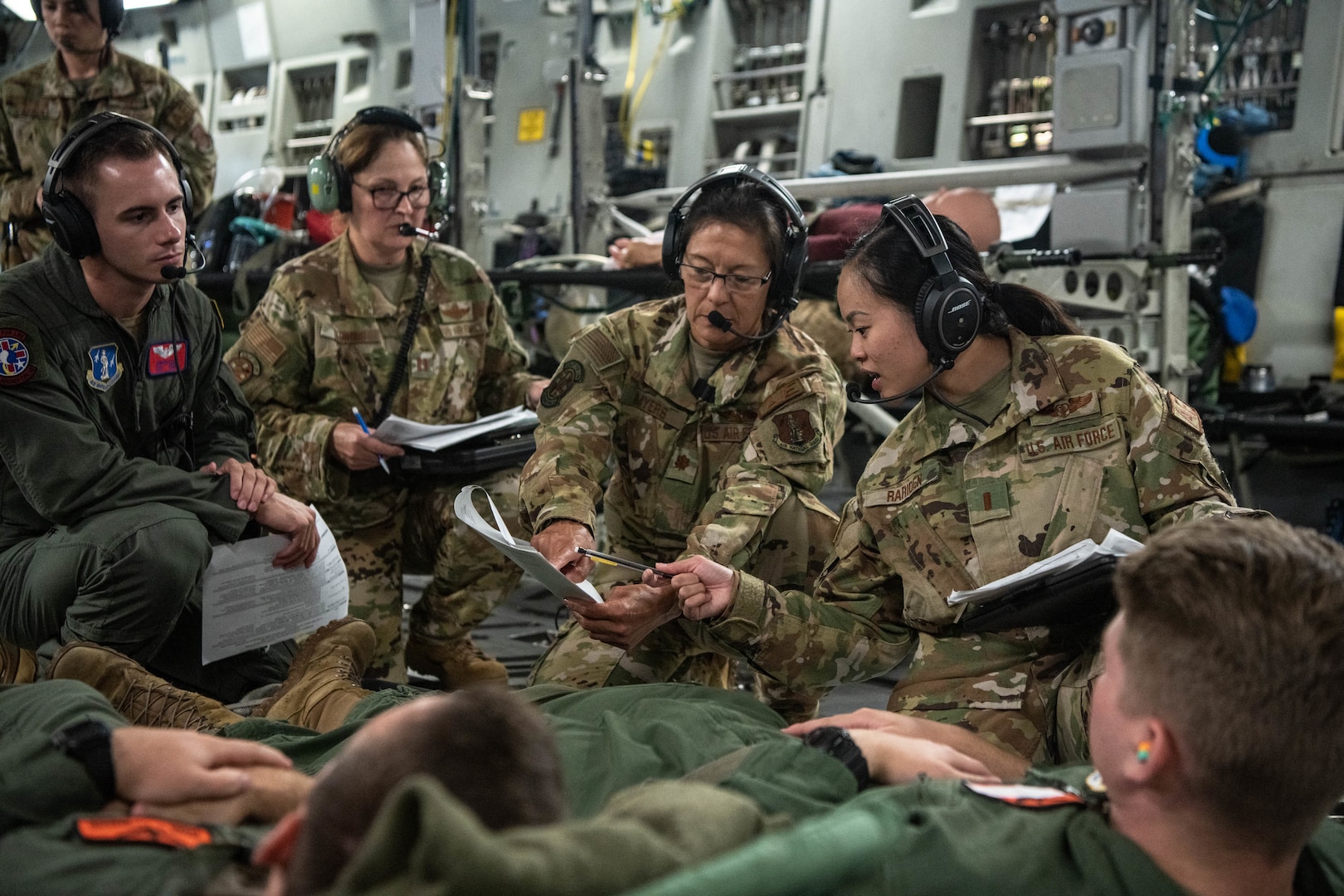 aeromedical evacuation medical airmen respond to a simulated medical event during a training flight