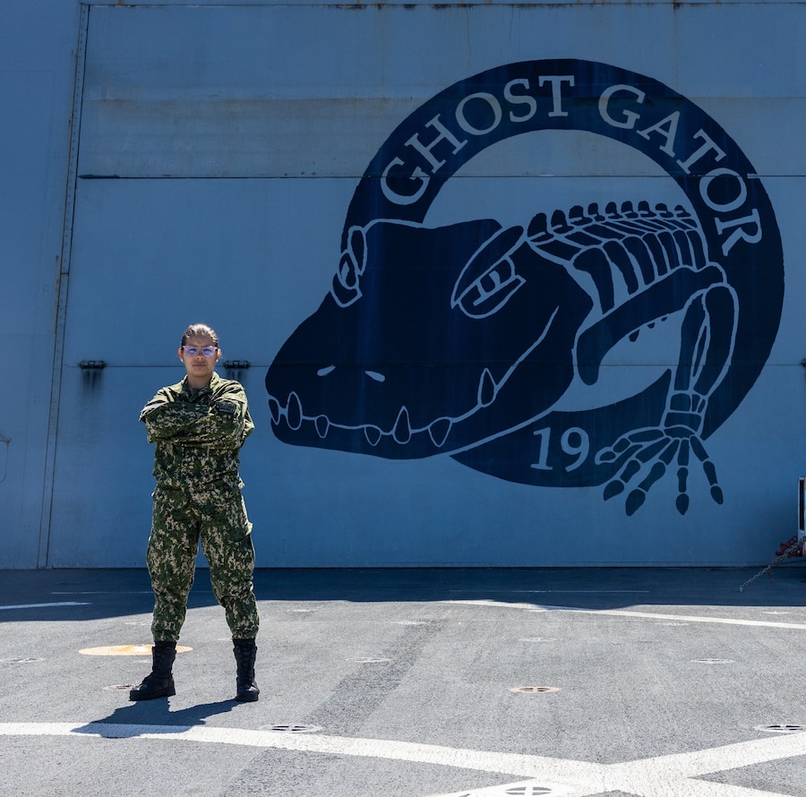 Marina Milagros Correa (Private Uruguayan Marine Corps) poses for a photo during exercise UNITAS LXIII aboard the USS Mesa Verde (LPD 19), Sept. 10, 2022. UNITAS, which is Latin for “unity,” was conceived in 1959 and has taken place annually since first conducted in 1960. UNITAS trains forces to conduct joint maritime operations through the execution of anti-surface, anti-submarine, anti-air, amphibious, and electronic warfare operations that enhance warfighting proficiency and increase interoperability among participating navy and marine forces. (U.S. Marine Corps photo by Lance Cpl. David Intriago)