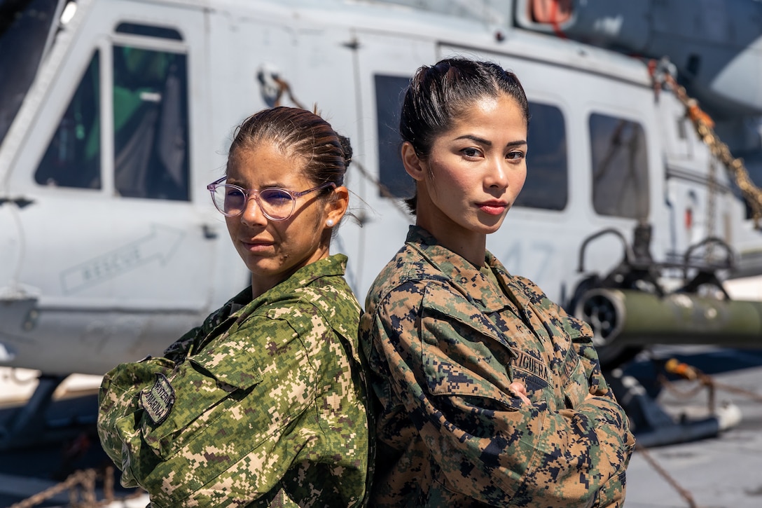 U.S. Marine Corps Lance Cpl. Charisse Briguera, right, a rifle Marine with Delta Company, 4th Light Armored Reconnaissance Battalion, 4th Marine Division, in support of Special Purpose Marine Air-Ground Task Force UNITAS LXIII poses for a photo with Marina Milagros Correa (Private Uruguayan Marine Corps) during exercise UNITAS LXIII aboard the USS Mesa Verde (LPD 19), Sept. 10, 2022. UNITAS is the world’s longest-running annual multinational maritime exercise that focuses on enhancing interoperability among multiple nations and joint forces during littoral and amphibious operations in order to build on existing regional partnerships and create new enduring relationships that promote peace, stability, and prosperity in the U.S. Southern Command’s area of responsibility. (U.S. Marine Corps photo by Lance Cpl. David Intriago)