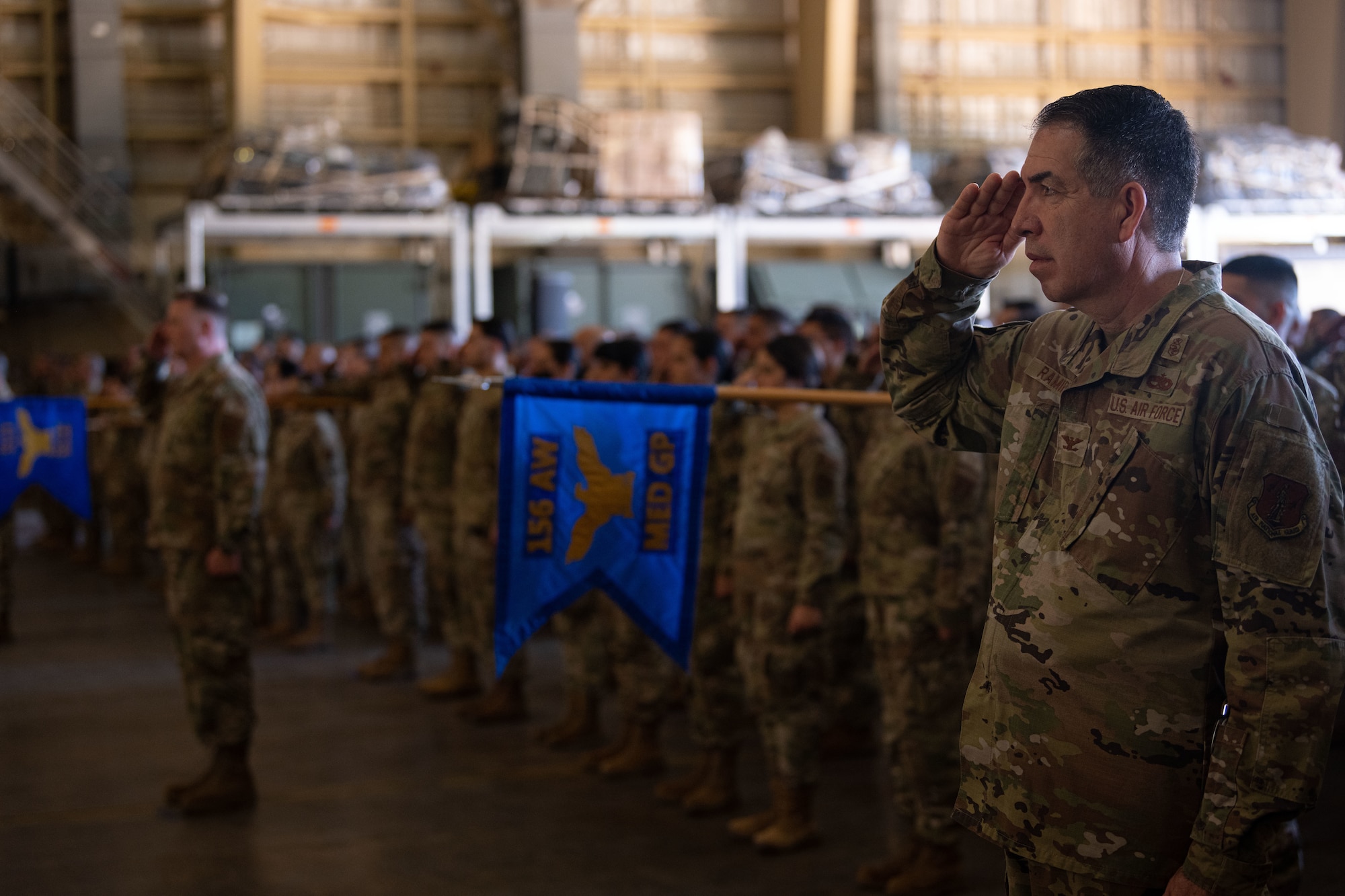 U.S. Air Force Col. Patrick Ramirez, the 156th Medical Group commander, and Airmen with the 156th Wing render U.S. Air Force Col. Pete Boone, the 156th Wing commander, his final salute as wing commander during the 156th Wing change of command ceremony at Muñiz Air National Guard Base, Carolina, Puerto Rico, Oct. 15, 2022. The change of command ceremony took place during the October regularly scheduled drill. (U.S. Air National Guard photo by Staff Sgt. Eliezer Soto)