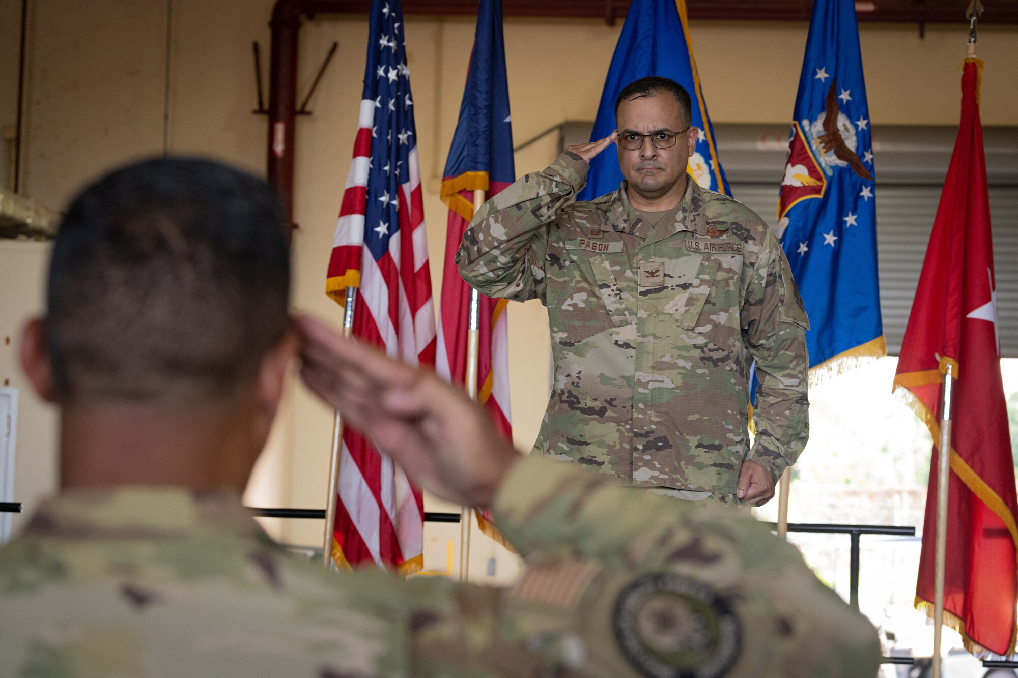 U.S. Air Force Col. Humberto Pabon Jr., the 156th Wing commander, receives his first salute from Airmen with the Puerto Rico Air National Guard during the 156th Wing change of command ceremony at Muñiz Air National Guard Base, Carolina, Puerto Rico, Oct. 15, 2022. The change of command ceremony took place during the October regularly scheduled drill. (U.S. Air National Guard photo by Staff Sgt. Eliezer Soto)