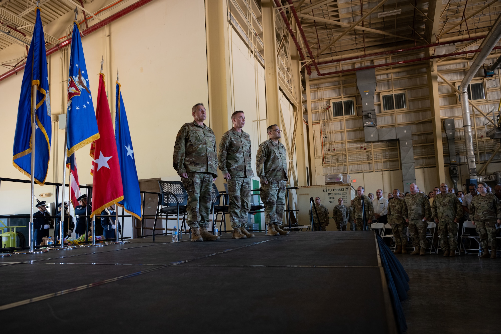 From left, U.S. Air Force, Brig. Gen. Paul Loiselle, the assistant adjutant general-air, Puerto Rico Air National Guard, U.S. Air Force Col. Pete Boone, the outgoing 156th Wing commander and U.S. Air Force Col. Humberto Pabon Jr., the incoming 156th wing commander, stand at attention during a change of command ceremony at Muniz Air National Guard Base, Carolina, Puerto Rico, Oct. 15, 2022. The change of command ceremony took place during the October regularly scheduled drill. (U.S. Air National Guard photo by Staff Sergeant Eliezer Soto)