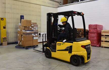 A worker in the U.S. Army Medical Materiel Center-Korea distribution warehouse prepares a pallet of medical materiel for delivery to a customer. USAMMC-K was recently recognized for its strong safety culture with the U.S. Army Safety Excellence Streamer, which requires zero incidents in the past 12 months and 100% participation in required risk management training